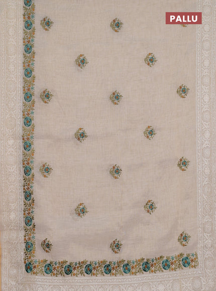 Linen cotton saree cream and teal blue with embroidery buttas and embroidery work zari border