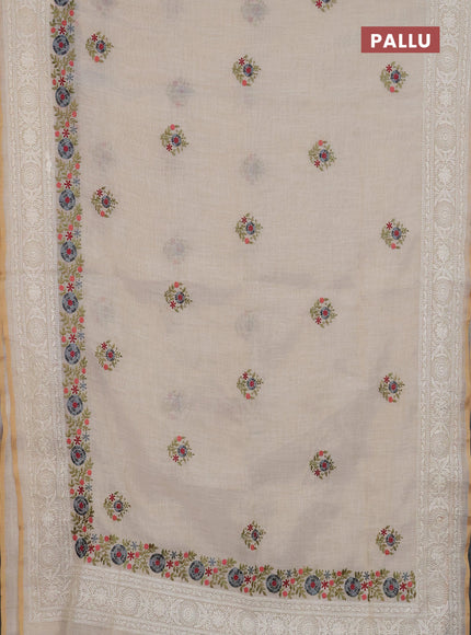 Linen cotton saree cream and grey with embroidery buttas and embroidery work zari border