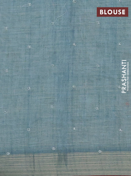 Linen cotton saree pastel blue and maroon with embroidery buttas and embroidery work zari border