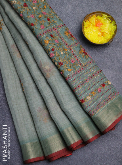 Linen cotton saree pastel blue and maroon with embroidery buttas and zari woven border