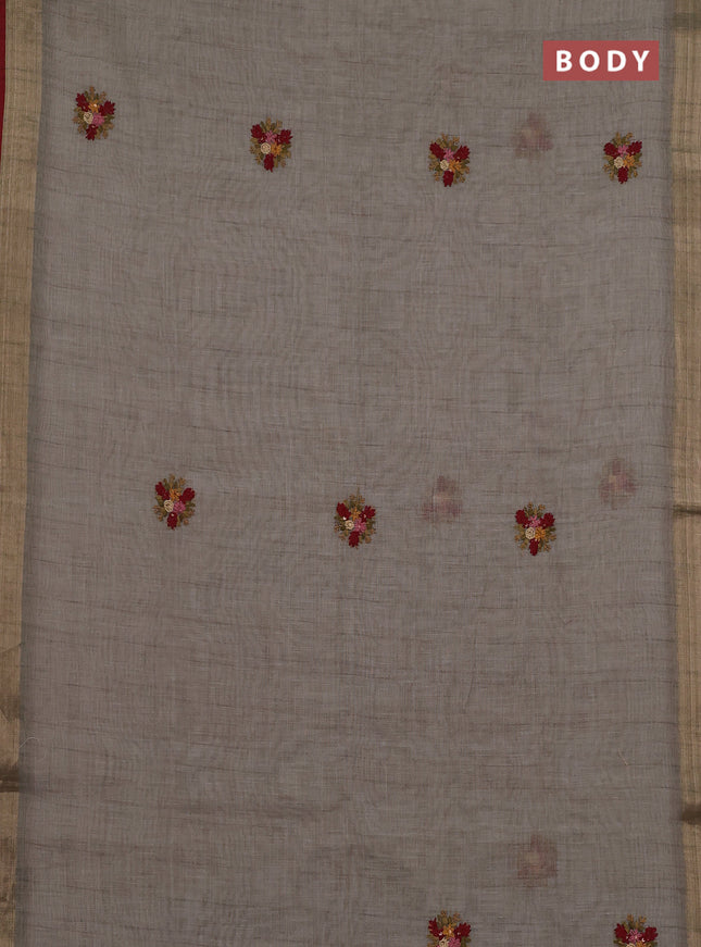 Linen cotton saree grey and maroon with embroidery buttas and zari woven border