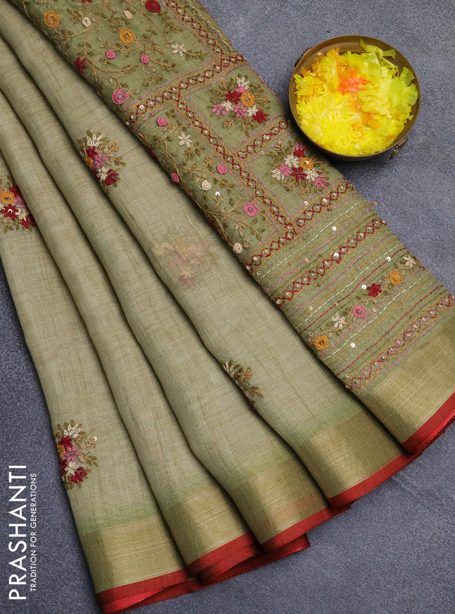 Linen cotton saree light green and maroon with embroidery buttas and zari woven border