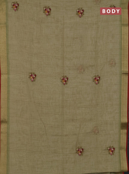 Linen cotton saree light green and maroon with embroidery buttas and zari woven border