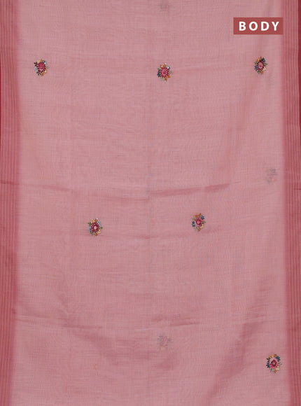 Linen cotton saree light pink with embroidery buttas and zari woven border