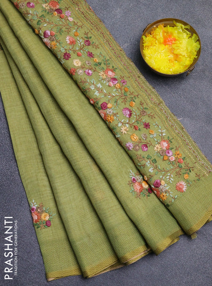 Linen cotton saree light green with embroidery buttas and printed border