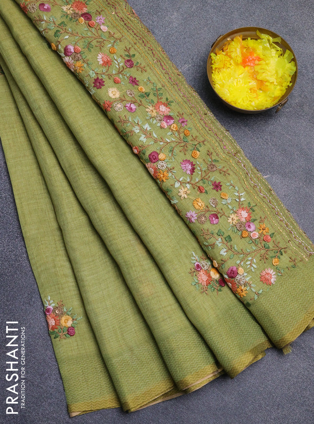 Linen cotton saree light green with embroidery buttas and printed border