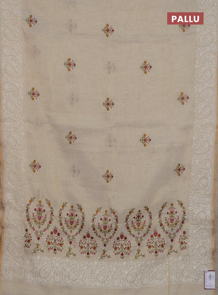 Linen cotton saree cream and pink with embroidery buttas and embroidery border