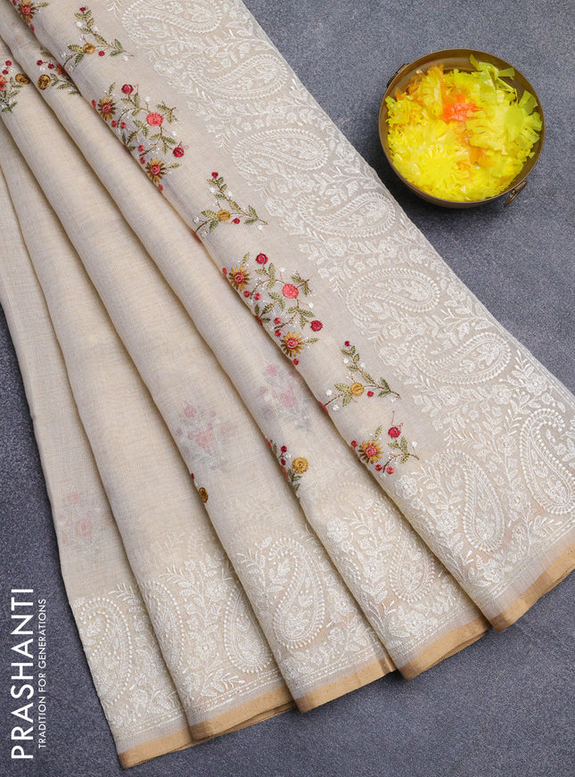 Linen cotton saree cream and maroon with embroidery buttas and embroidery border