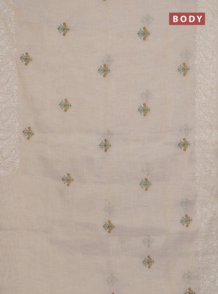 Linen cotton saree cream and teal green with embroidery buttas and embroidery border