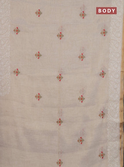 Linen cotton saree cream and peach shade with embroidery buttas and embroidery border