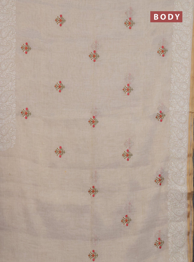 Linen cotton saree cream and peach shade with embroidery buttas and embroidery border