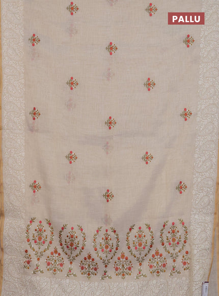 Linen cotton saree cream and peach shade with embroidery buttas and embroidery border