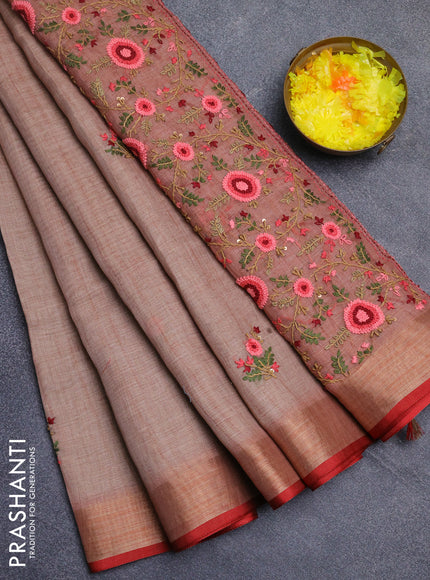 Linen cotton saree peach shade and maroon with embroidery buttas and zari woven border