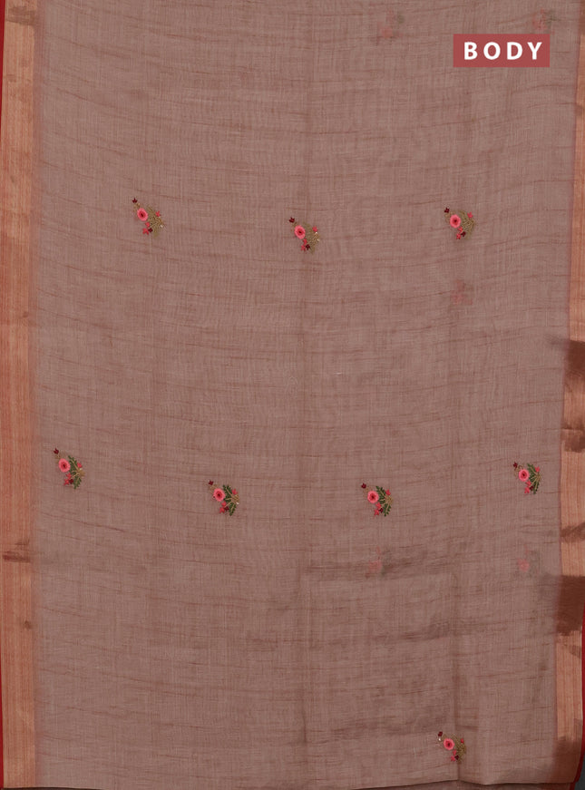Linen cotton saree peach shade and maroon with embroidery buttas and zari woven border