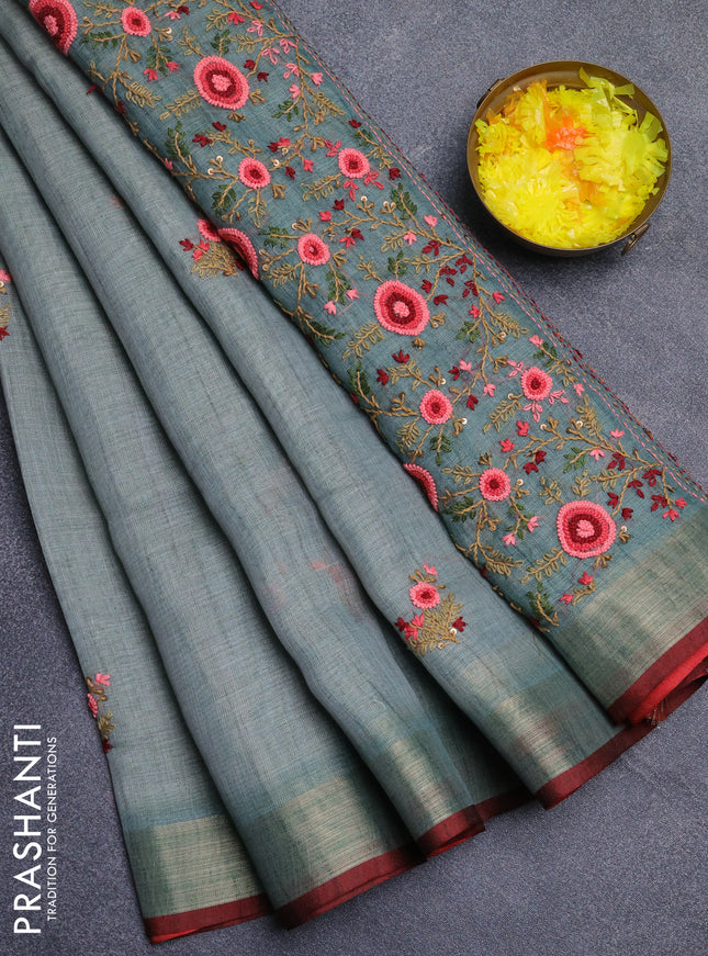 Linen cotton saree pastel blue and maroon with embroidery buttas and zari woven border