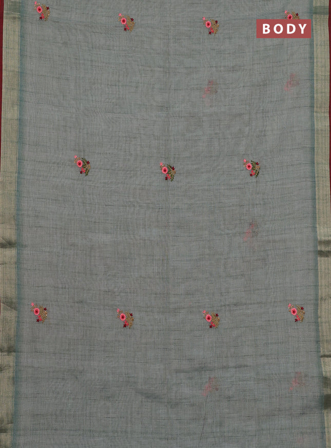 Linen cotton saree pastel blue and maroon with embroidery buttas and zari woven border