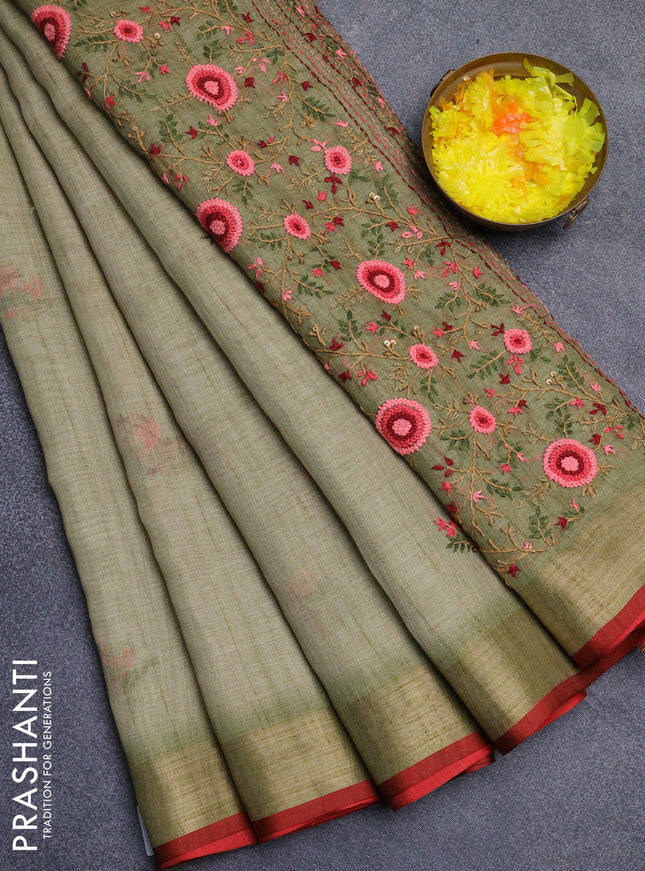 Linen cotton saree light green and maroon with embroidery buttas and zari woven border