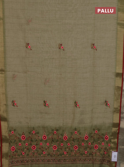 Linen cotton saree light green and maroon with embroidery buttas and zari woven border