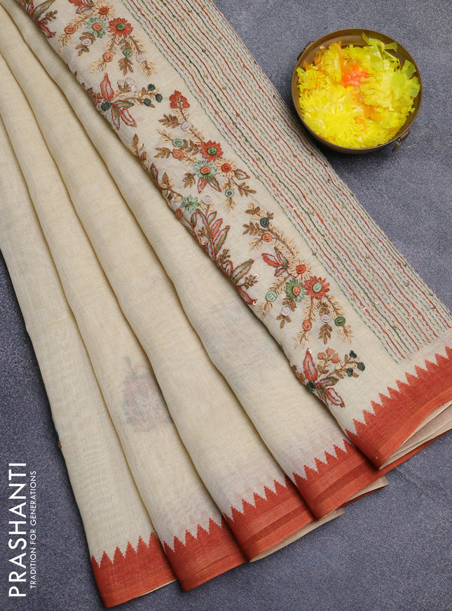 Linen cotton saree cream and rust shade with embroidery buttas and temple design simple border