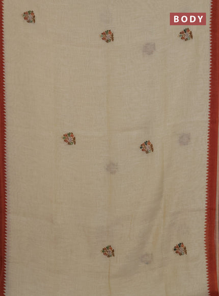 Linen cotton saree cream and rust shade with embroidery buttas and temple design simple border