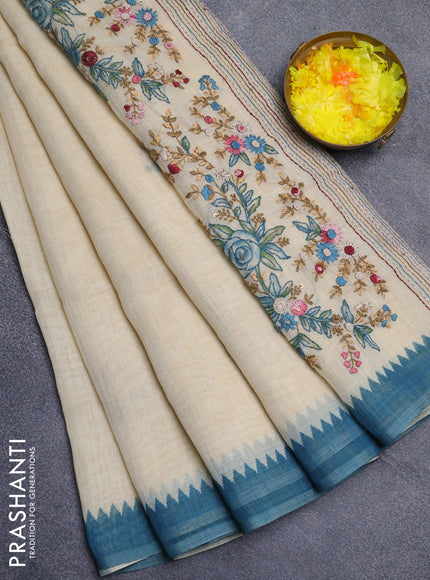 Linen cotton saree cream and blue with embroidery buttas and temple design simple border