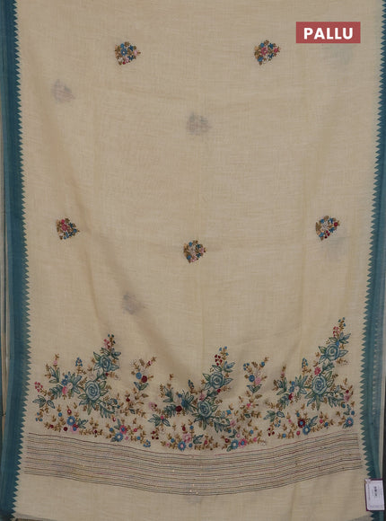 Linen cotton saree cream and blue with embroidery buttas and temple design simple border
