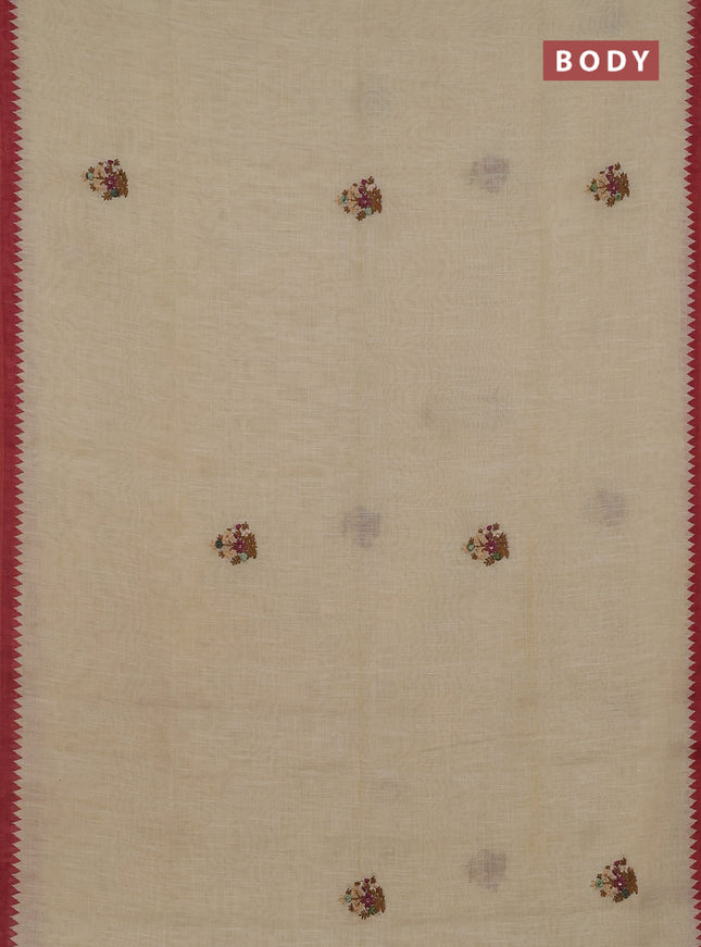 Linen cotton saree cream and rust shade with embroidery buttas and temple design simple border