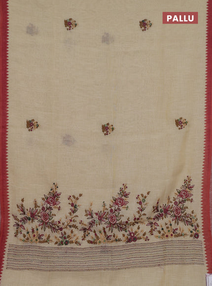 Linen cotton saree cream and rust shade with embroidery buttas and temple design simple border