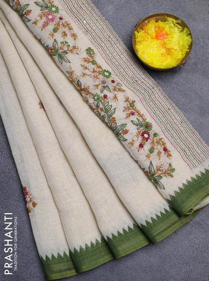 Linen cotton saree cream and light green with embroidery buttas and temple design simple border