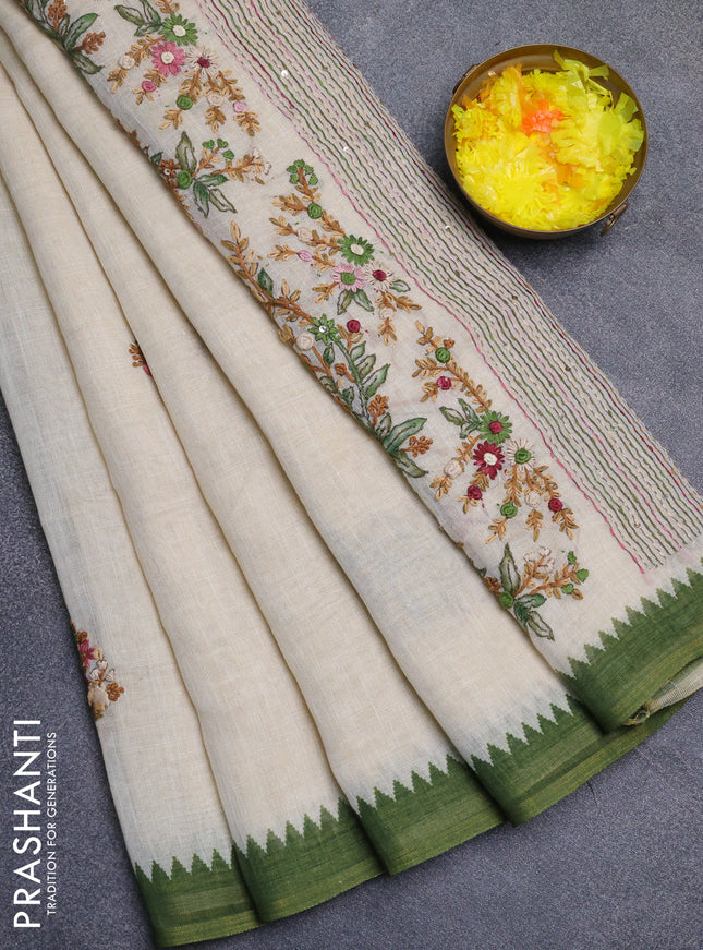 Linen cotton saree cream and light green with embroidery buttas and temple design simple border