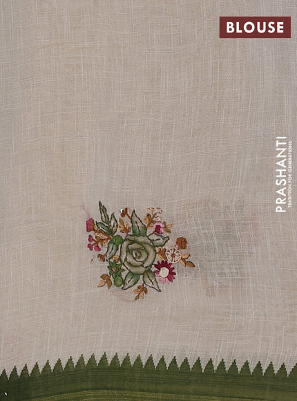 Linen cotton saree cream and light green with embroidery buttas and temple design simple border