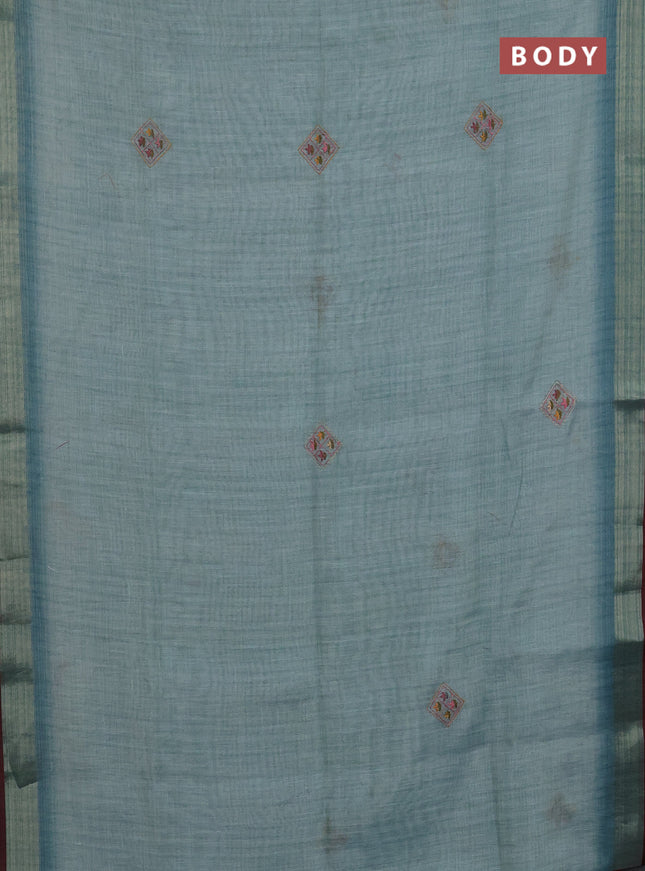 Linen cotton saree pastel blue and maroon with embroidery buttas and zari woven border