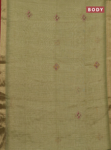 Linen cotton saree light green with embroidery buttas and zari woven border