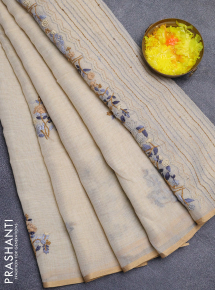 Linen cotton saree beige with embroidery buttas and zari woven border