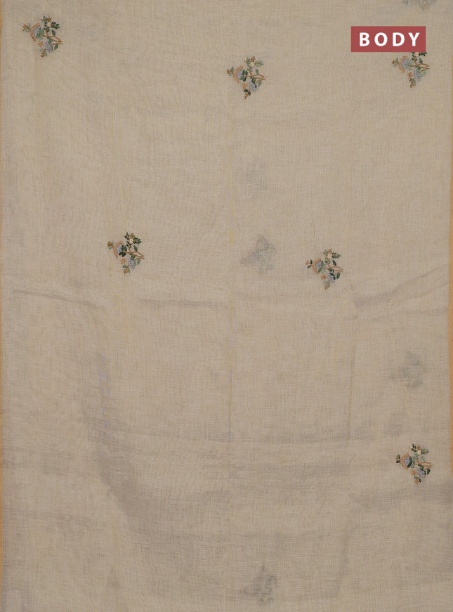 Linen cotton saree beige with embroidery buttas and zari woven border