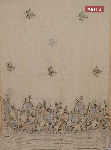 Linen cotton saree beige with embroidery buttas and zari woven border