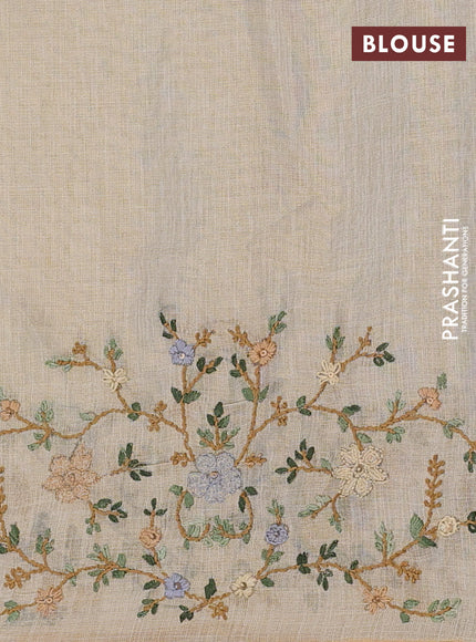 Linen cotton saree beige with embroidery buttas and zari woven border