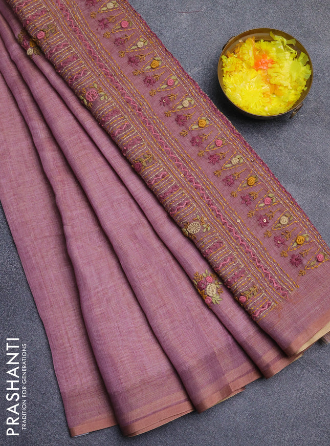 Linen cotton saree light pink with embroidery buttas and zari woven border