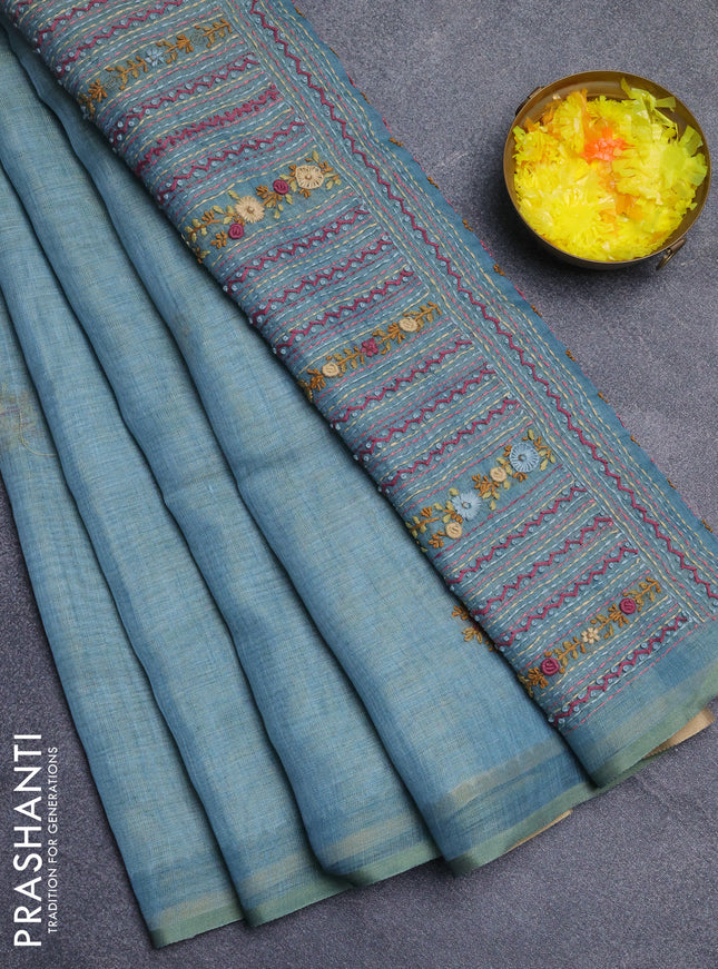 Linen cotton saree blue shade with embroidery buttas and zari woven border