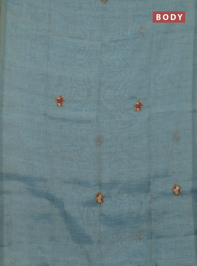 Linen cotton saree blue shade with embroidery buttas and zari woven border