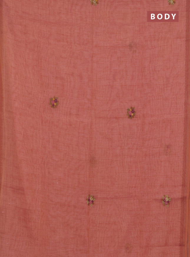 Linen cotton saree peach shade with embroidery buttas and zari woven border