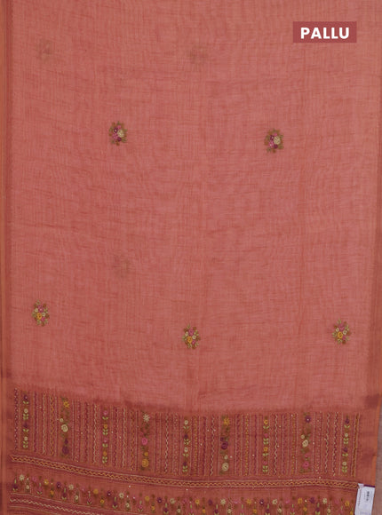 Linen cotton saree peach shade with embroidery buttas and zari woven border