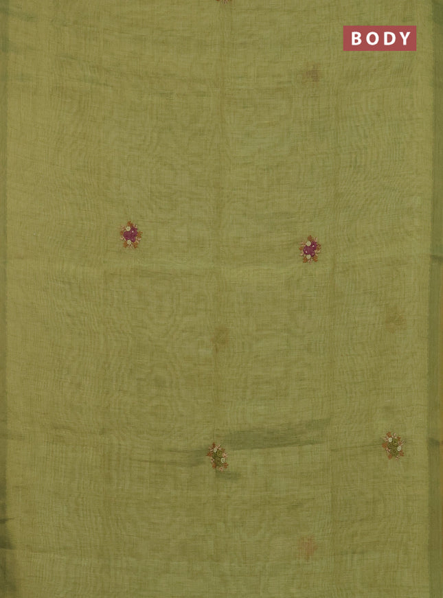 Linen cotton saree light green with embroidery buttas and zari woven border