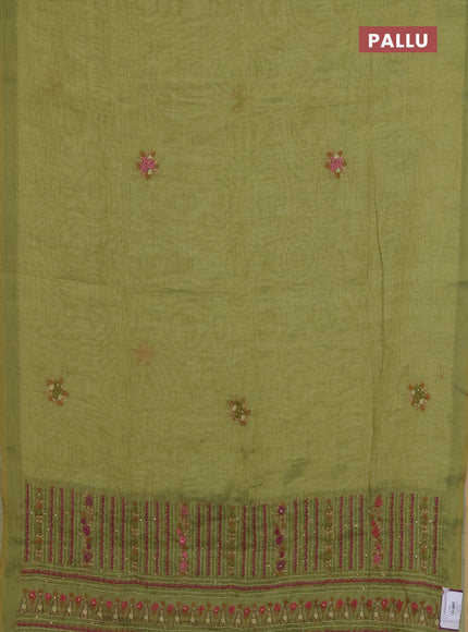 Linen cotton saree light green with embroidery buttas and zari woven border
