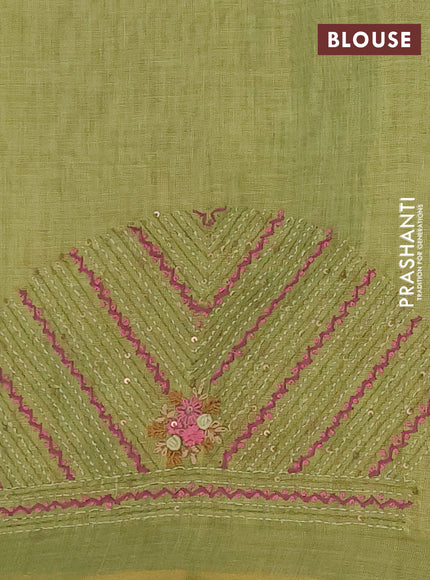 Linen cotton saree light green with embroidery buttas and zari woven border
