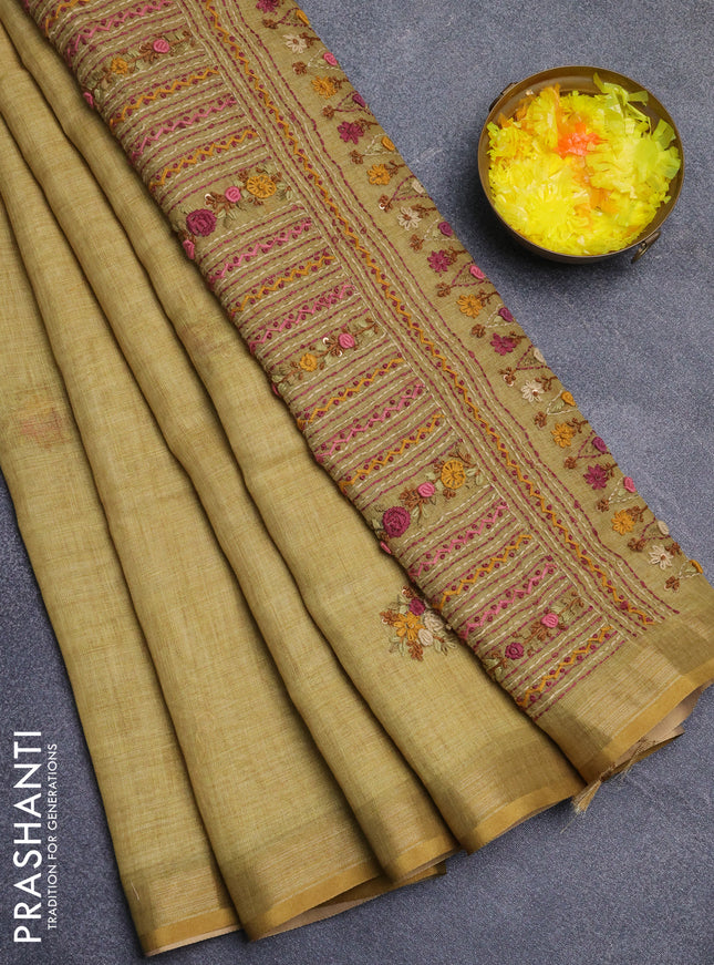Linen cotton saree mustard yelllow with embroidery buttas and zari woven border