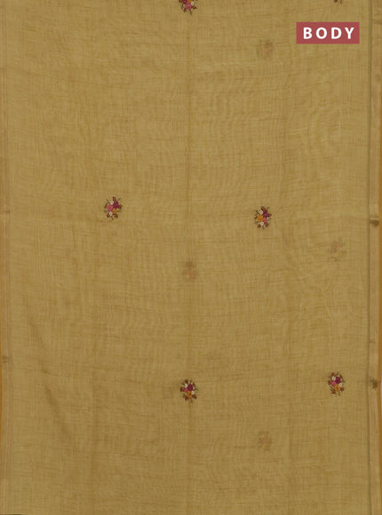 Linen cotton saree mustard yelllow with embroidery buttas and zari woven border