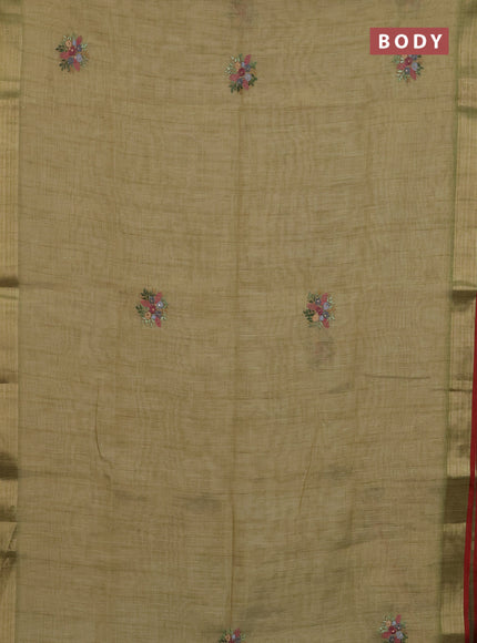 Linen cotton saree light green and maroon with embroidery buttas and zari woven border