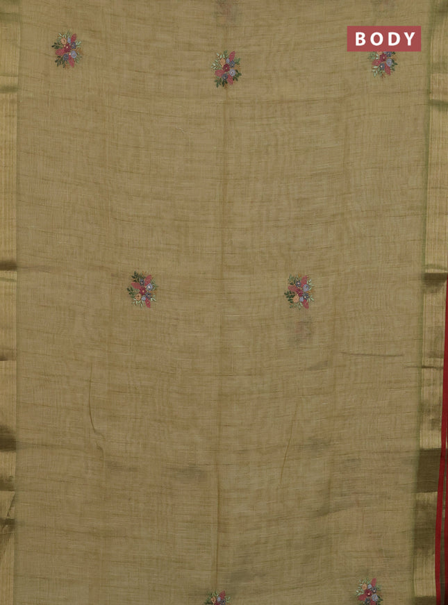 Linen cotton saree light green and maroon with embroidery buttas and zari woven border