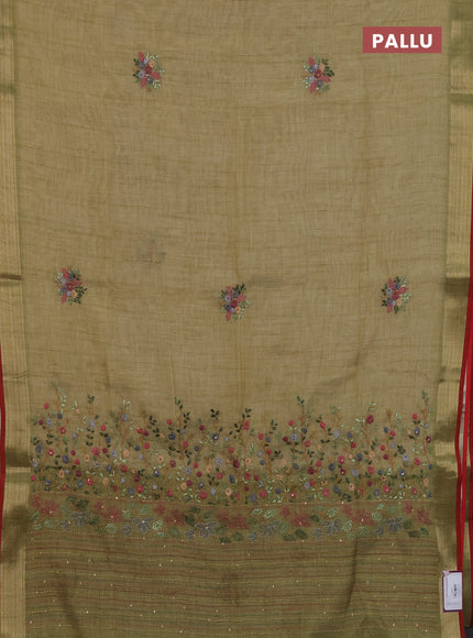 Linen cotton saree light green and maroon with embroidery buttas and zari woven border